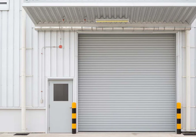Security roller shutter covering a large commercial entrance in Melbourne.